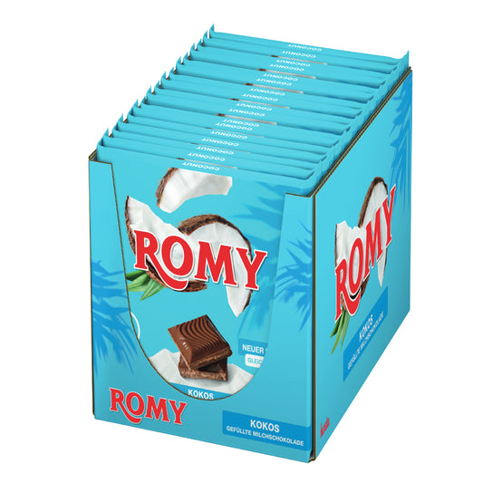 Bild von mehreren ROMY-Kokos-Schokoladentafeln in blauen Verpackungen, die in einem Karton angeordnet sind.